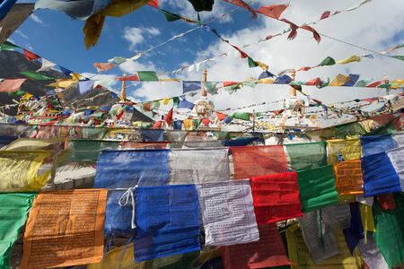 Prayer flags with stupas - Kunzum La pass - Himachal Pradesh - India の写真素材