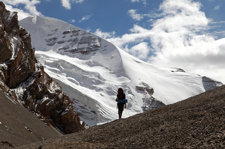 Silhouette of tourist on mountain - Takling La pass - Indian Himalayas - Indiaの写真素材