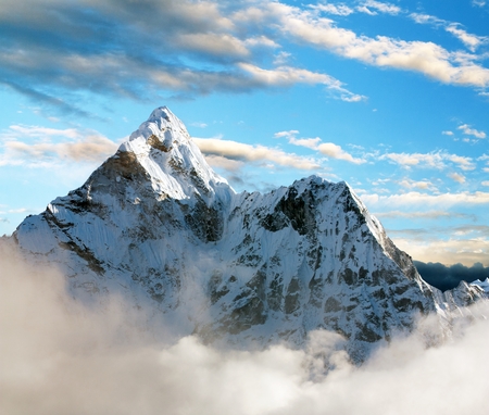 Beautiful view of Ama Dablam with and beautiful clouds - Sagarmatha national park - Khumbu valley - Trek to Everest base cam - Nepalの写真素材