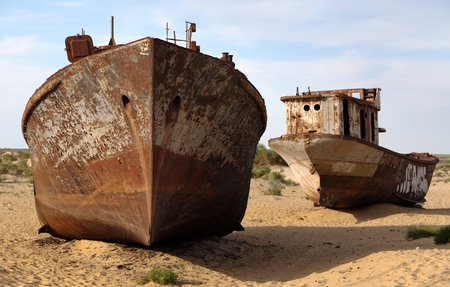 Boats in desert around Moynaq, Muynak or Moynoq - Aral sea or Aral lake - Uzbekistan - asiaの写真素材