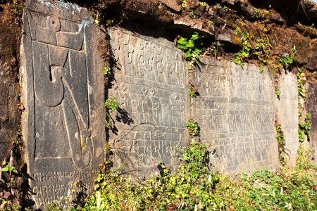 Mani wall and stones with buddhist symbolsの写真素材