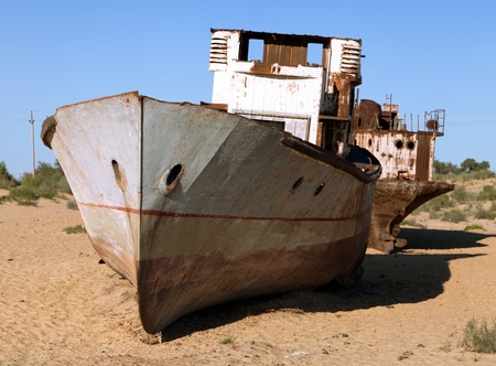Boats in desert around Moynaq, Muynak or Moynoq - Aral sea or Aral lake - Uzbekistan - asiaの写真素材