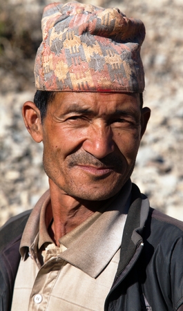 DDOGADI VILLAGE, WESTERN NEPAL, 30TH NOVEMBER 2013 - Nepal man with typical nepali hat on headのeditorial素材