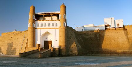 evening view of fortres Ark - Ark entrance - City of Bukhara - Uzbekistanのeditorial素材