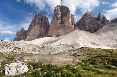 Drei Zinnen or Tre Cime di Lavaredo with green meadow and beautiful sky, Sextener Dolomiten or Dolomiti di Sesto, South Tirol, Dolomiten mountains view, Italien Alpsの写真素材