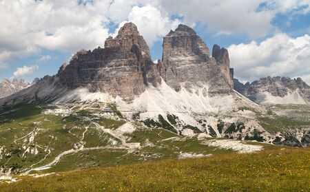 Drei Zinnen or Tre Cime di Lavaredo with green meadow and beautiful sky, Sextener Dolomiten or Dolomiti di Sesto, South Tirol, Dolomiten mountains view, Italien Alpsの写真素材