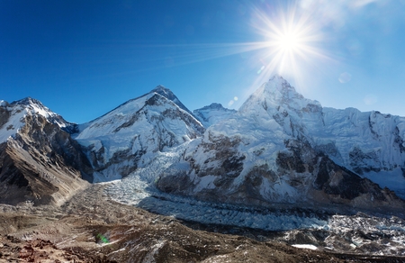 Morning sun above Mount Everest, lhotse and Nuptse from Pumo Ri base camp - Way to Everest base camp - Sagarmatha national park - Nepalの写真素材