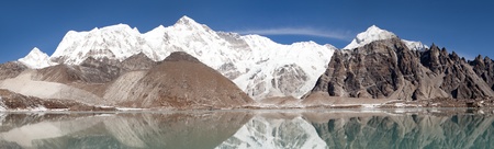 view of Cho Oyu mirroring in lake - Cho Oyu base camp - Everest trek - Nepalの写真素材
