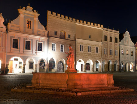 TELC, CZECH REPUBLIC, 28TH AUGUST 2015 - night view of Telc or Teltsch town square with statue of st. Margaret in public fountain, Czech republic. World heritage site by unescoのeditorial素材