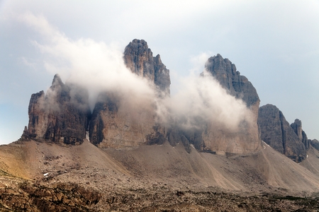 Drei Zinnen or Tre Cime di Lavaredo with fog, Sextener Dolomiten or Dolomiti di Sesto, South Tirol, Dolomiten mountains, Italien Alpsの写真素材