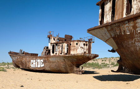 MUYNAK, UZBEKISTAN, 13th JUNE 2013 - Boats in desert around Moynaq, Muynak or Moynoq - Aral sea or Aral lake - Uzbekistan - asiaのeditorial素材