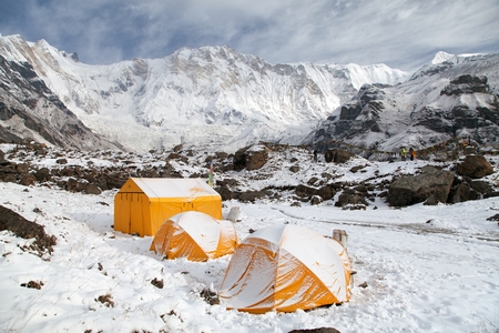 View of Mount Annapurna with tents from base camp, Nepalの写真素材