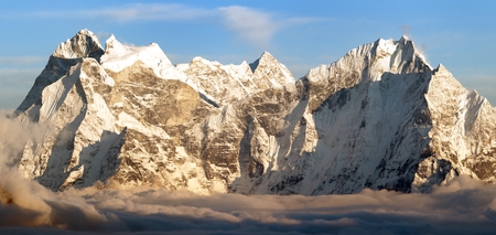 Evening panoramic view of mounts Kangtega and Thamserku fromm Gokyo Ri, Everest area, Khumbu valley, Nepalの写真素材