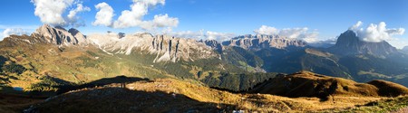 Evening panoramic view of Geislergruppe or Gruppo delle Odle and Sella gruppe or Gruppo di Sella, Alps Dolomites mountains, Dolomiti, Italy Evening panoramic view of Geislergruppe or Gruppo delle Odle and Sella gruppe or Gruppo di Sella, Alps Dolomites mountains, Dolomiti, Italy