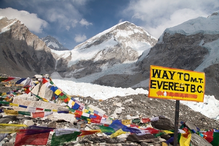 signpost way to mount everest b.c., Khumbu glacier and prayer flags, Everest area, Nepalの写真素材