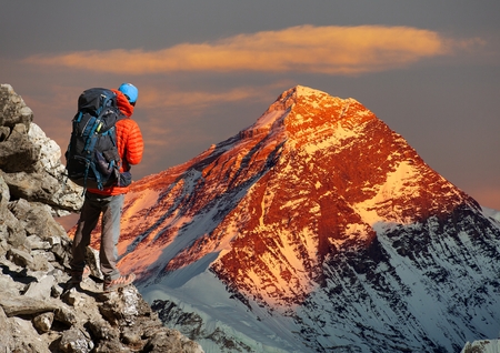 Evening colored view of Mount Everest from Gokyo valley with tourist on the way to Everest base camp, Sagarmatha national park, Khumbu valley, Solukhumbu, Nepal Himalayas mountainsの写真素材