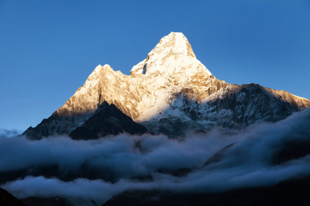 Evening view of Ama Dablam with beautiful clouds and blue sky, Khumbu valley, Solukhumbu, Nepal...