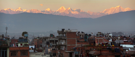 Evening panoramic view of Patan or Pathan town and Kathmandu city with Himalayas mountains, Nepalの写真素材