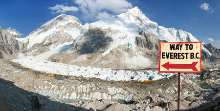 signpost way to mount Everest b.c. and Mount Everest, Lhotse and Nuptse from Pumo Ri base camp - way to Mount Everest base camp, Nepal himalayas mountainsの写真素材