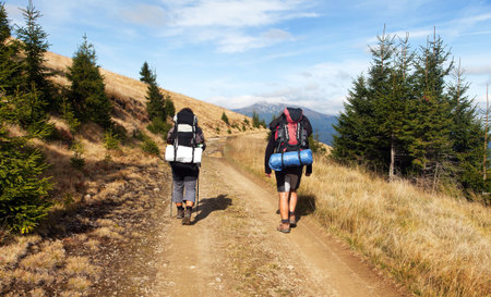Mount Hoverla or Goverla with two tourists, Ukraine Karpathian mountains