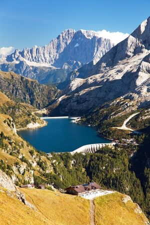 View of lago di Fedaia and mount Civetta, Dolomiti, Italyの写真素材
