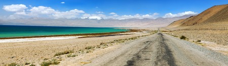 Karakul lake and Pamir range in Tajikistan. Landscape around Pamir highway M41 international road, roof of the worldの写真素材