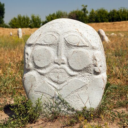 historic stone statue sculpture near Burana Tower in the Chuy Valley at northern of the country's capital Bishkek, Kyrgyzstanの写真素材