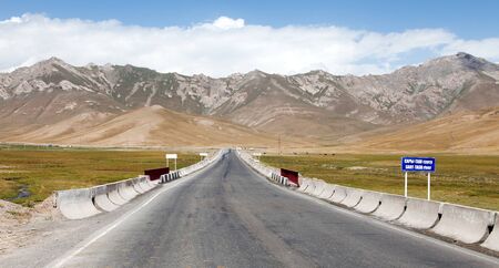Beautiful landscape panorama of Tian Shan mountains in Kyrgyzstan from Sary Tash village. Pamir highwayの写真素材