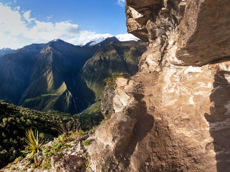 pathway and rock face, Mount Saksarayuq, Andes mountains, Choquequirao trekking trail near Machu Picchuの写真素材
