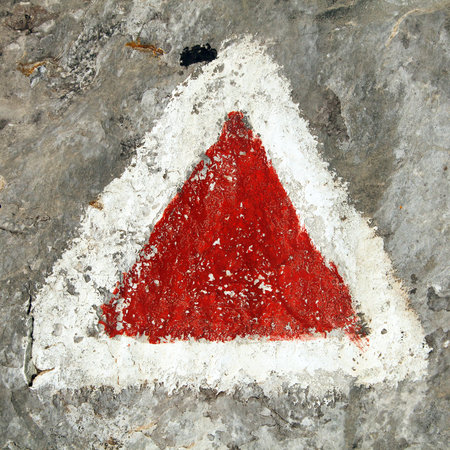 red and white hiking trail signs symbols on grey background