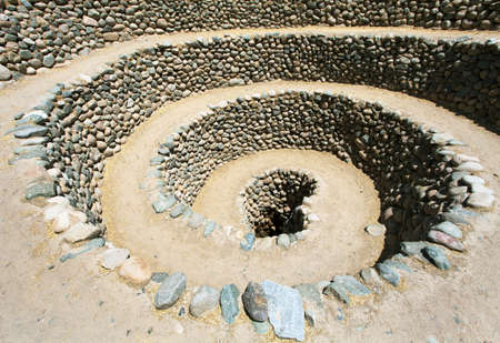 Cantalloc Aqueduct in Nazca or Nazca town, spiral or circle aqueducts or wells, Peru, Inca architecture and cultureの写真素材