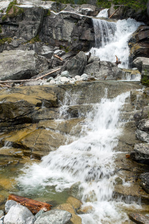Waterfalls at stream Studeny potok in High Tatras mountains, Carpathia, Slovakiaの写真素材