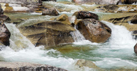 Waterfalls at stream Studeny potok in High Tatras mountains, Carpathia, Slovakiaの写真素材