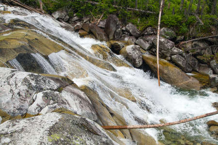 Waterfalls at stream Studeny potok in High Tatras mountains, Carpathia, Slovakiaの写真素材