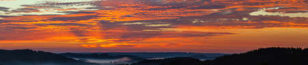 Morning evening panoramic sunset view of beautiful sky from Bohemian and Moravian highland near Krasne villageの写真素材