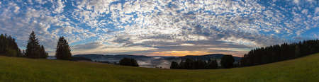 Morning evening panoramic sunset view of beautiful sky from Bohemian and Moravian highland near Krasne villageの写真素材