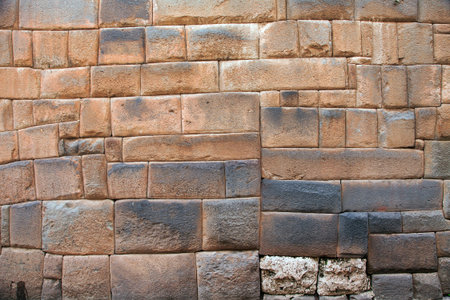 Detail of stone wall in Cusco or Cuzco town, Historic incan architecture, Peru