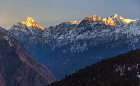 Panoramic view of mount Nanda Devi, one of the best mounts in Indian Himalaya, seen from Joshimath Auli, Uttarakhand, India, evening sunset viewの写真素材