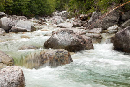 Waterfalls at stream Studeny potok in High Tatras mountains, Carpathia, Slovakiaの写真素材