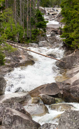 Waterfalls at stream Studeny potok in High Tatras mountains, Carpathia, Slovakiaの写真素材