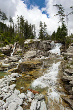 Waterfalls at stream Studeny potok in High Tatras mountains, Carpathia, Slovakiaの写真素材