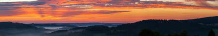 Morning evening panoramic sunset view of beautiful sky from Bohemian and Moravian highland near Krasne villageの写真素材