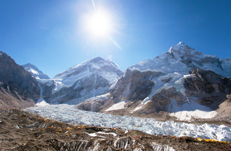 Morning sun above Mount Everest base camp and khumbu glacier, Nepal Himalayas mountainsの写真素材