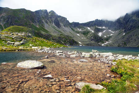 Velke hincovo pleso lake and mount Koprovsky stit, Vysoke Tatry mountains, Carpathia, Slovakiaの写真素材