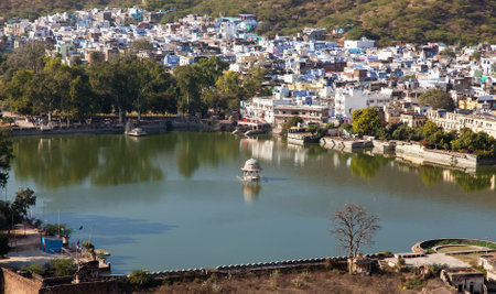 Bundi town and Nawal Sagar lake with small hinduist temple, Rajasthan, Indiaのeditorial素材