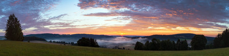 Morning evening panoramic sunset view of beautiful sky from Bohemian and Moravian highland near...