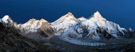 nightly view of Mount Everest isolated on blue sky background, Lhotse and Nuptse from mount Pumo Ri base camp , Nepal Himalayas mountainsの写真素材