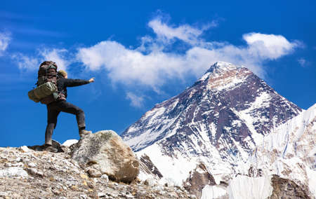 Mount Everest seen from Gokyo valley with tourist on the way to Everest base camp, Sagarmatha national park, Khumbu valley, Nepal Himalayas mountainsの写真素材