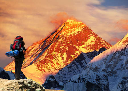 Evening colored view of Mount Everest from Gokyo valley with tourist on the way to Everest base camp, Sagarmatha national park, Khumbu valley, Solukhumbu,  Nepal Himalayaの写真素材