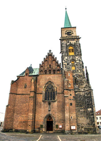 Medieval gothic catholic church of Saint Jilji with clock tower in Nymburk town, Central Bohemia, Czech Republicの写真素材